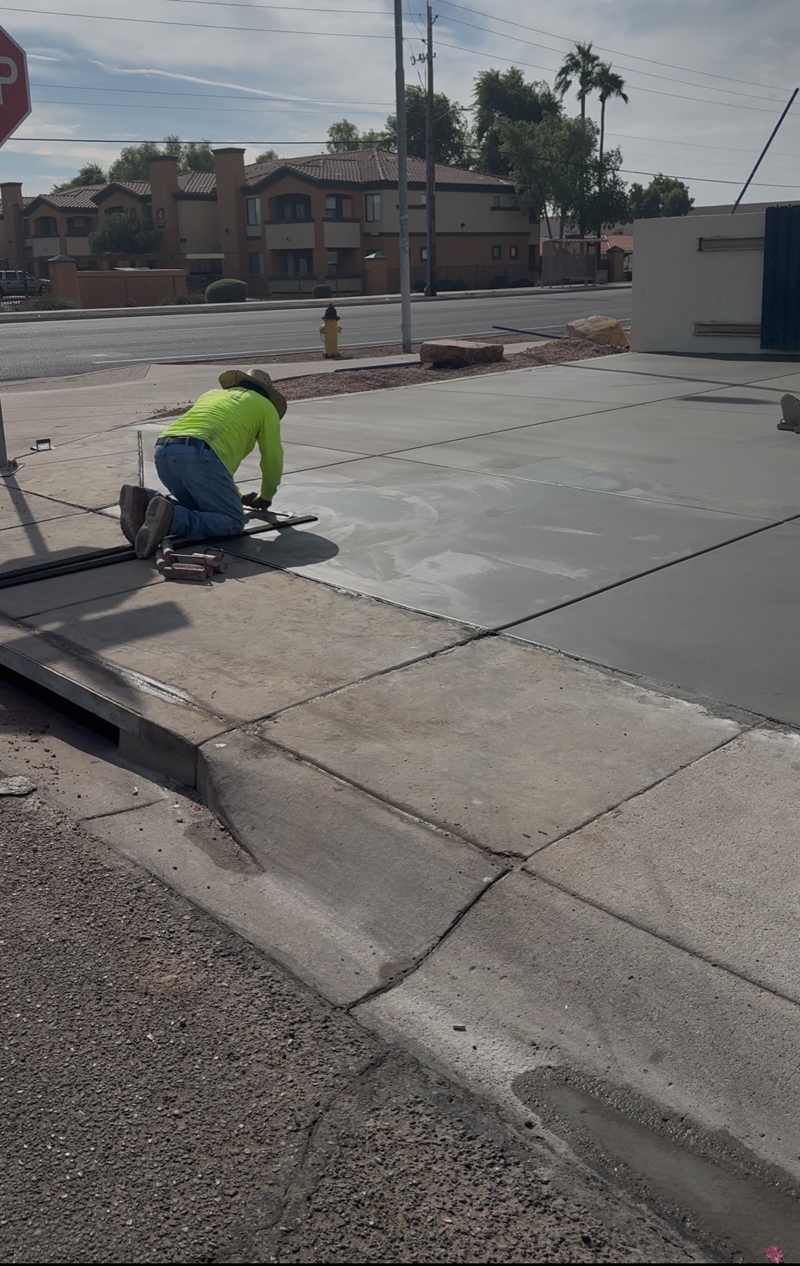 Crew finishing sidewalk